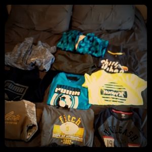 Lot of large boys name brand shirts